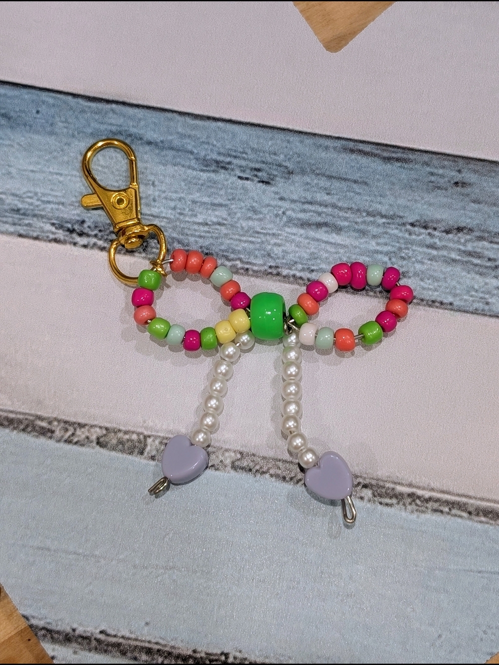 Handmade Multicolor Beaded Bow Keychain with Purple Heart Accents